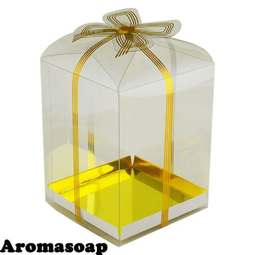 Plastic box with gold bow and gold bottom