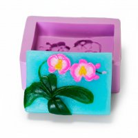 Орхидея на веточке с листиками элит-форма